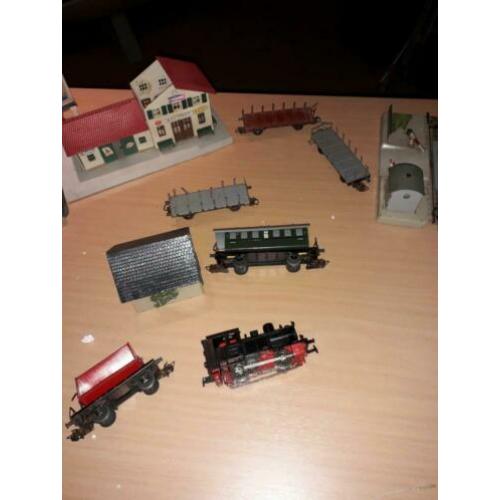te koop oude trein set met veel rails wissel en huisjes en t