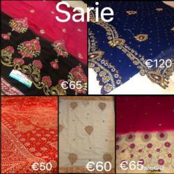 Mooie sarie: crème met donker roze en bloemen