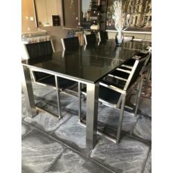 Tuinset Vivaldi marmeren tafelblad en rvs stoelen 304x100cm