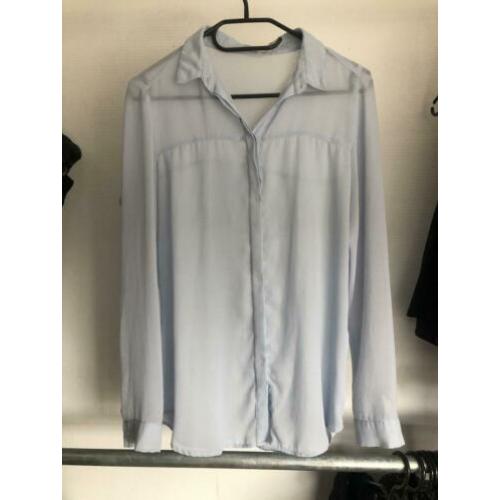 Doorzichtige lichtblauwe blouse maat s