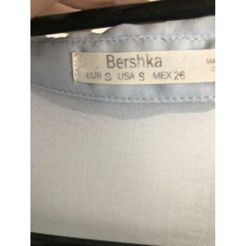 Doorzichtige lichtblauwe blouse maat s