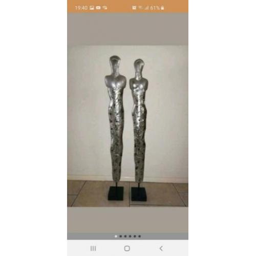 Man en vrouw beelden