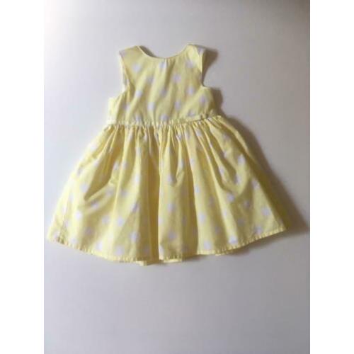 Lichtgeel jurkje met witte stippen. Maat 80