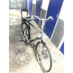 Goede heren fiets met kinderstoeltje met AXA slotje