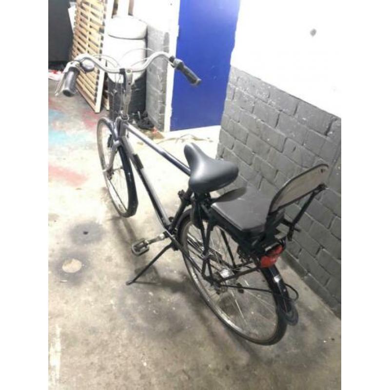 Goede heren fiets met kinderstoeltje met AXA slotje