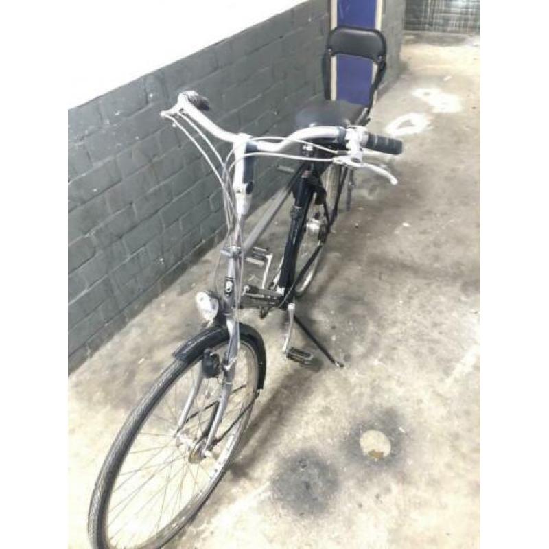 Goede heren fiets met kinderstoeltje met AXA slotje