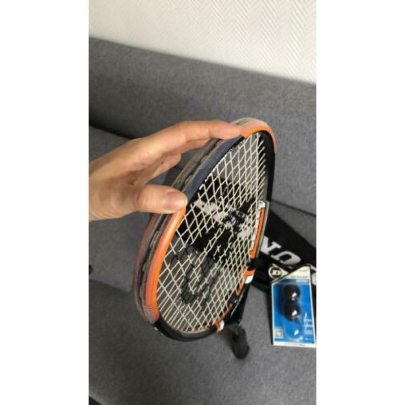 Dunlop Squash racket rarely used. 2 Dunlop balls new