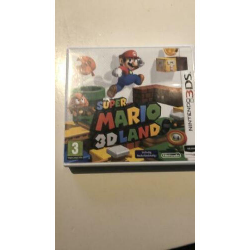 Nintendo 3DS XL met twee games en beschermhoes te koop