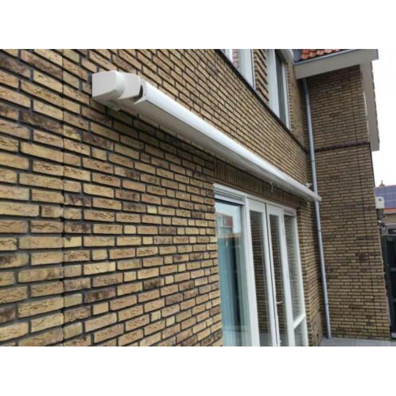 Knikarm zonnescherm