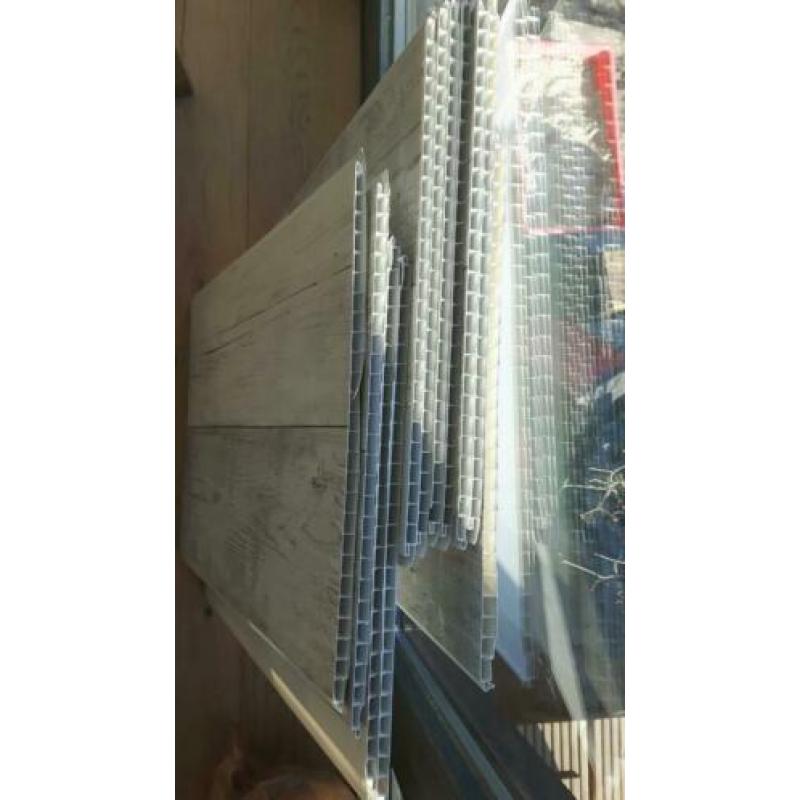 Restpartij Grosfillex wandplaten. Houtlook grijs