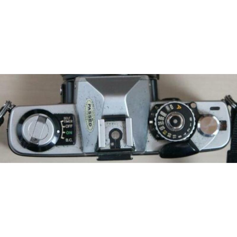 Minolta xg-1 met 2 lenzen en metz flitser in tas
