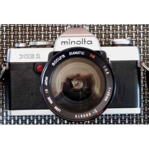 Minolta xg-1 met 2 lenzen en metz flitser in tas