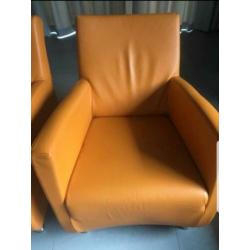 Oranje lederen stoelen. Goed onderhouden!
