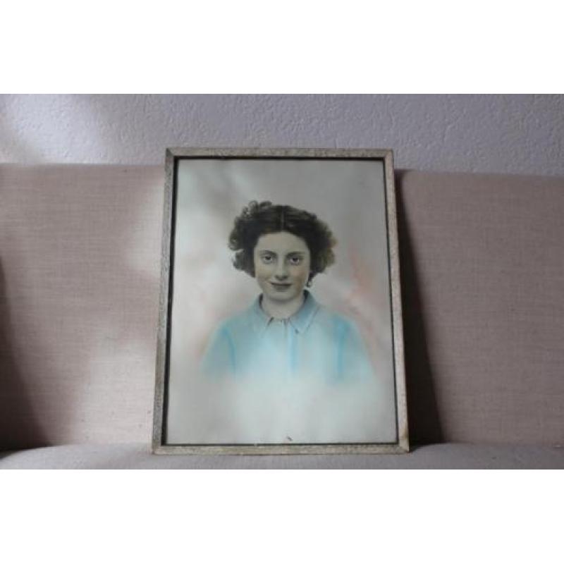 Een nostalgische plaat in oude lijst, blauw, roze