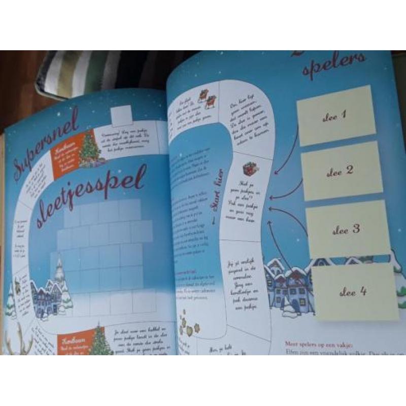 Het boek van de kerstman liedjes, recepten, spel,knutselen