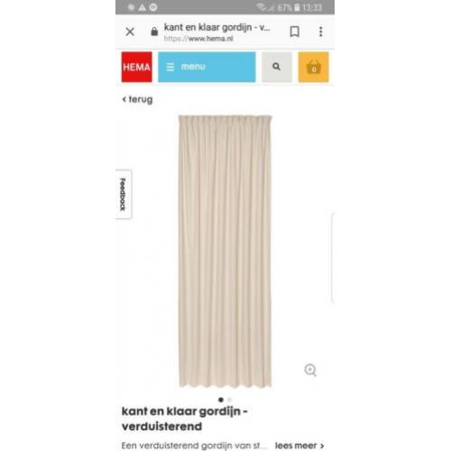 Vier creme kleurige verduisterende gordijnen